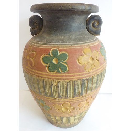 29 - A large painted terracotta vase