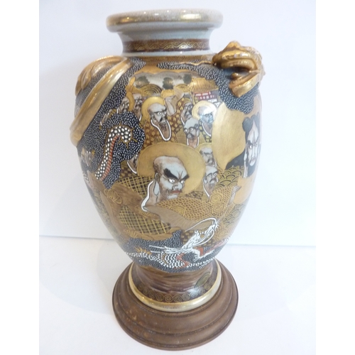 49 - A Meiji period Satsuma decorated vase and stand