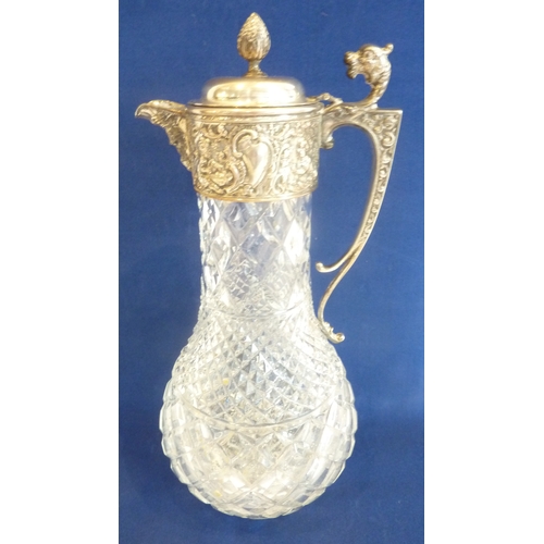 58 - A heavy crystal and silver-plated claret jug