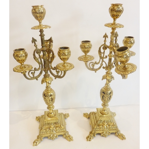 74 - A matched pair of four-branch candelabra