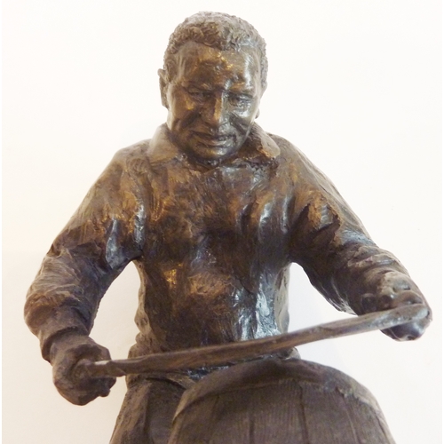 76 - A cold-cast bronze figure of a cooper; the wooden stand with plaque inscribed 'The Wadworth 6X Maide... 