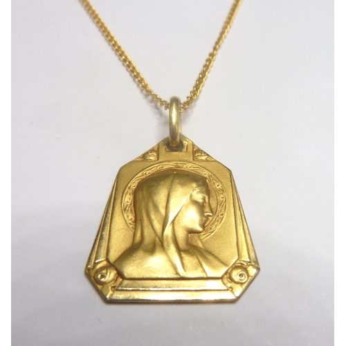 104 - An 18-carat gold Madonna pendant with 9-carat chain