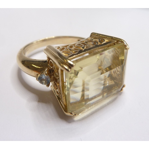 93 - A 9-carat dress ring set with a large citrine-like stone