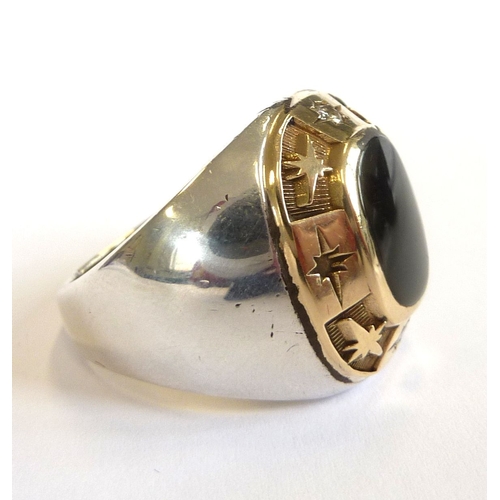 99 - An American 14-carat gold and white metal diamond college ring