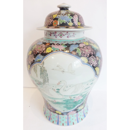 24 - A large decorative Chinese jar and cover