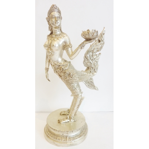 82 - A Tibetan deity, half-woman half-bird, cast in white metal