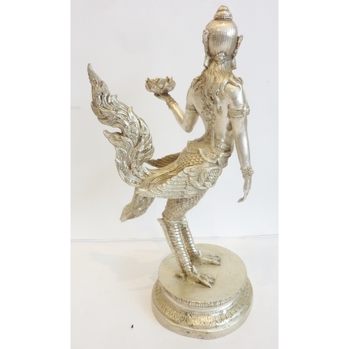 82 - A Tibetan deity, half-woman half-bird, cast in white metal