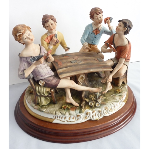 33 - 'Card players' - a large Capodimonte group on a wooden base