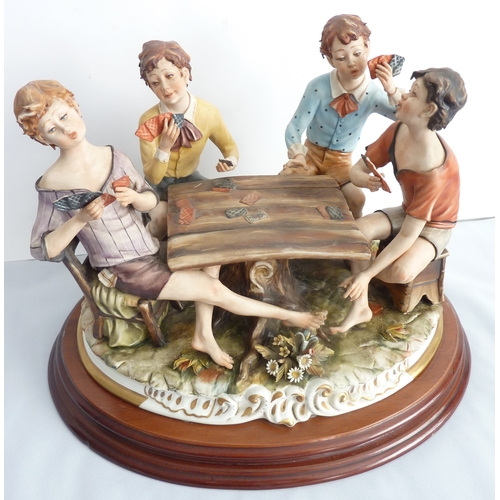 33 - 'Card players' - a large Capodimonte group on a wooden base