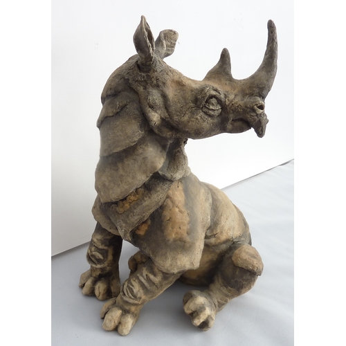 45 - 'Spike' - a large Country Artists model of a seated rhino