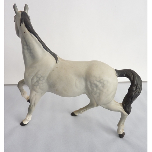 50 - A Beswick model of a dapple-grey horse