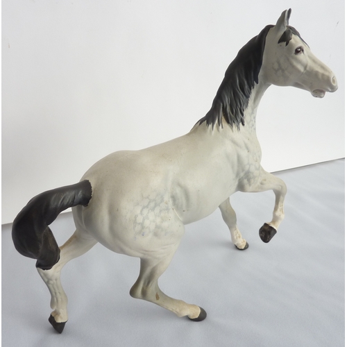 50 - A Beswick model of a dapple-grey horse