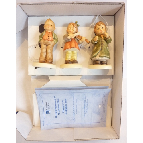 11 - A trio of Hummel figures in one 'Exclusive Edition' box, HUM20384