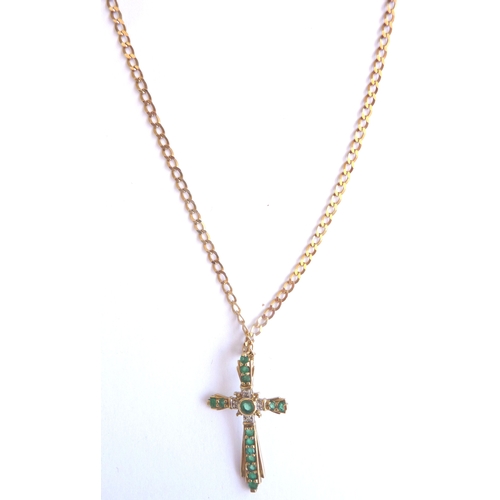 91 - A boxed 9-carat yellow-gold crucifix pendant set with varying sized emeralds; together with a 9-cara... 