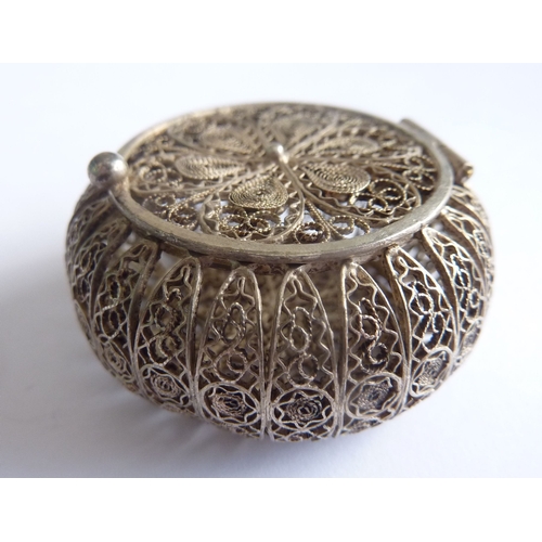 86A - ADDED LOT       Two Eastern white metal filigree boxes; each with hinged lid, one decorated with a f... 