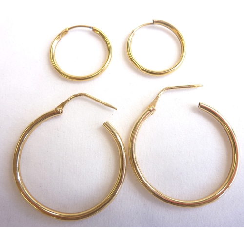 107 - Two pairs of 9-carat gold hoop earrings