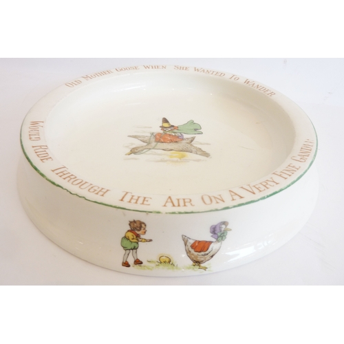 44J - An unusual pottery baby plate with 'Mother Goose' decoration by Crown Ducal