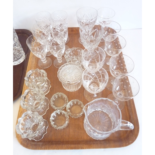 61 - A good selection of mostly hand-cut drinking glasses to include tumblers, shots and sherries