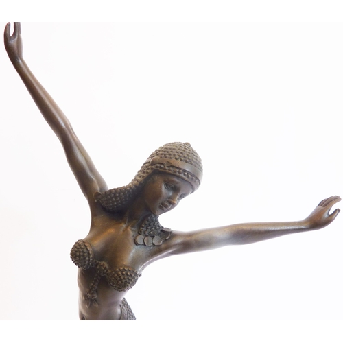 71 - An Art Deco style (reproduction) bronze dancing figure