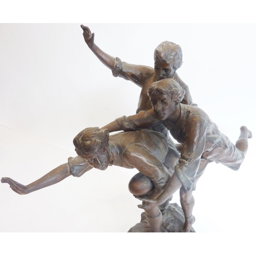 72 - An early 20th century bronzed figure, 'Foot Ball'; together with others similar