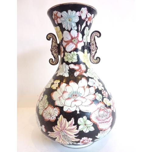 73 - A floral enamel-on-copper Chinese vase with turquoise-blue interior