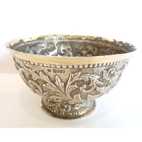 81 - A 19th century hallmarked-silver circular sugar bowl decorated in repoussé style with various scroll... 