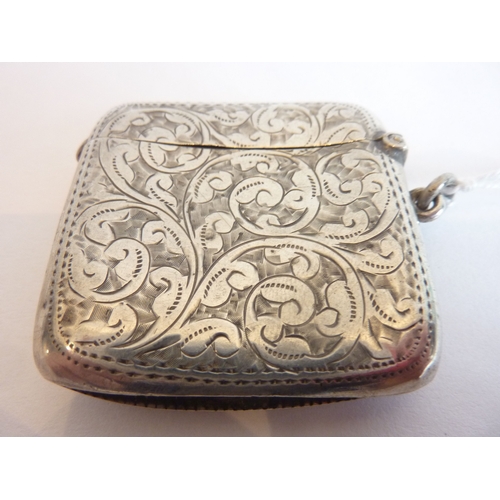 87 - A hallmarked silver vesta case; its cartouche engraved 'E Bryant'