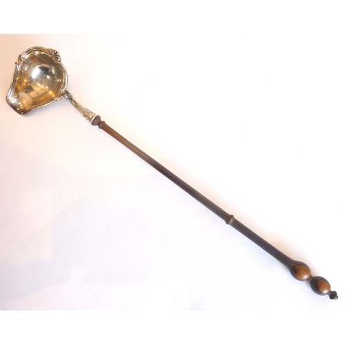 88 - A 19th century white metal toddy ladle with fruitwood handle