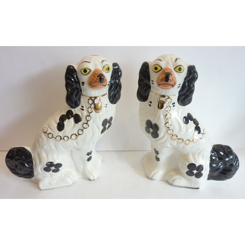 38 - A large pair of Staffordshire dog figures