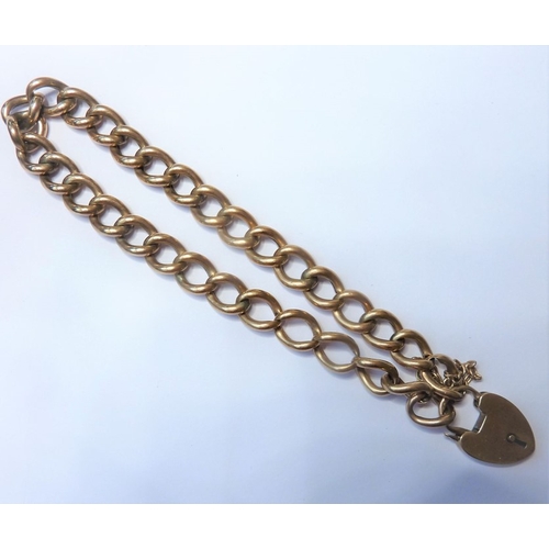 187 - A 9-carat rose-gold bracelet chain with heart-shaped padlock (approx. 12.04gm)
 (The cost of UK post... 