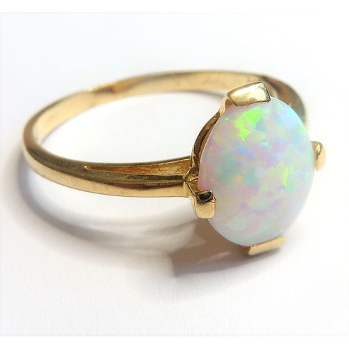 188 - A vintage 14-carat gold ring set with a large opal
 (The cost of UK postage via Royal Mail Special D... 