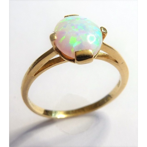 188 - A vintage 14-carat gold ring set with a large opal
 (The cost of UK postage via Royal Mail Special D... 