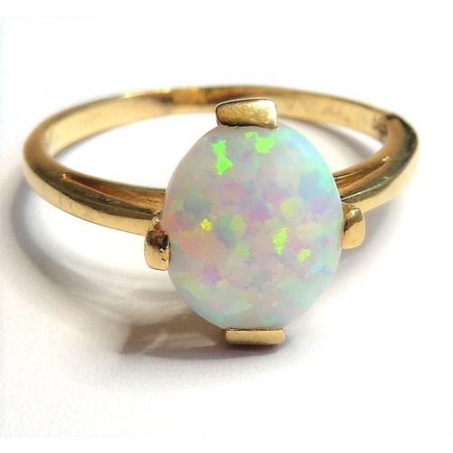 188 - A vintage 14-carat gold ring set with a large opal
 (The cost of UK postage via Royal Mail Special D... 