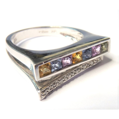 189 - An 18-carat white-gold ring set with a row of diamonds and a row of coloured sapphires
 (The cost of... 