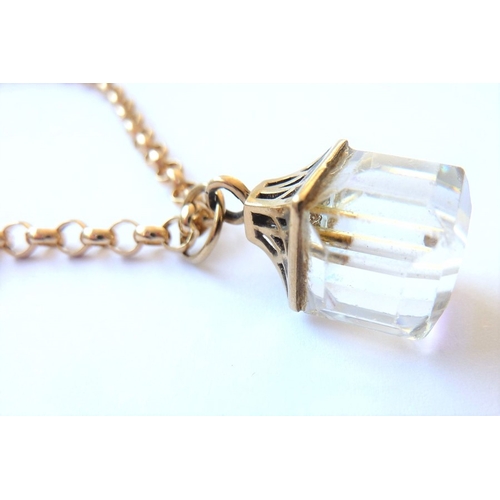 191 - A 9-carat gold and crystal pendant and a 9-carat gold chain
 (The cost of UK postage via Royal Mail ... 