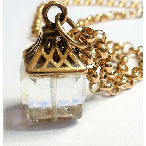 191 - A 9-carat gold and crystal pendant and a 9-carat gold chain
 (The cost of UK postage via Royal Mail ... 