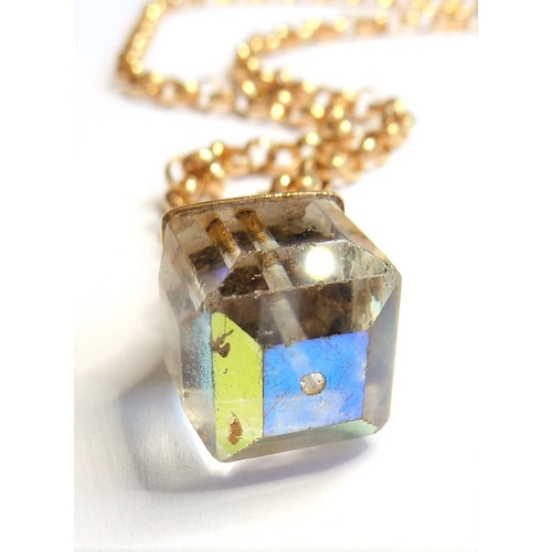 191 - A 9-carat gold and crystal pendant and a 9-carat gold chain
 (The cost of UK postage via Royal Mail ... 