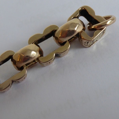 193 - A Victorian 9-carat rose-gold double Albert chain bracelet (full length 21.5cm; total weight approx.... 