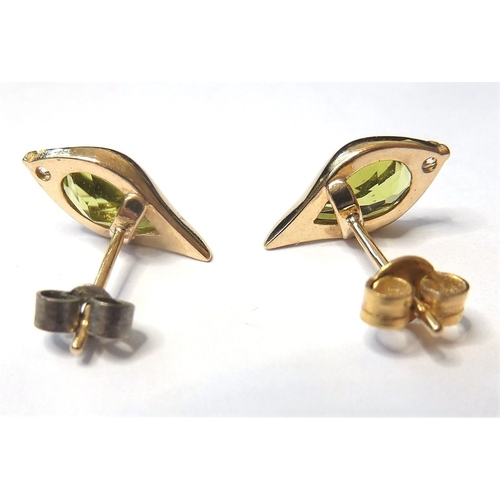 202 - A pair of 9-carat gold, peridot and diamond ear studs
 (The cost of UK postage via Royal Mail Specia... 