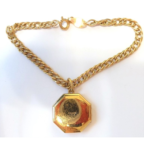 208 - A 9-carat gold bracelet together with a rose-gold photo locket
 (The cost of UK postage via Royal Ma... 