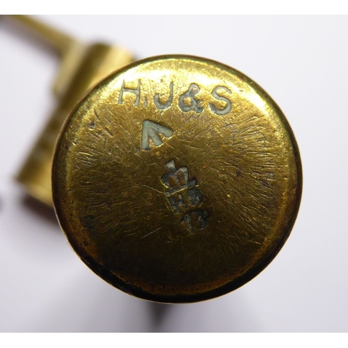 238 - A 19th century gunpowder and lead-shot measure, together with an oil container for a .303 rifle with... 