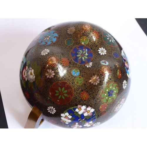 114 - A Japanese Meiji period two-handled cloisonné koro; the pierced dome topped cover flanked by two ang... 