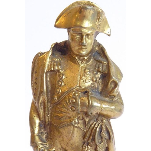 118 - A heavy gilt-bronze model of Napoleon standing upon elevated jagged rockwork, probably late 19th/ear... 