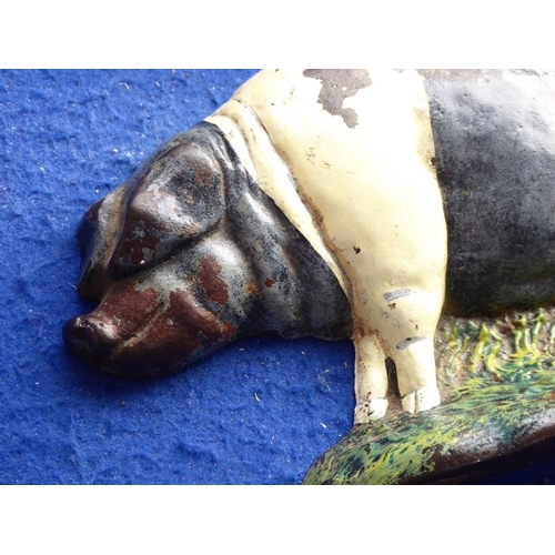 120 - An early 20th century hand painted cast iron doorstop modelled as a pig (20cm)