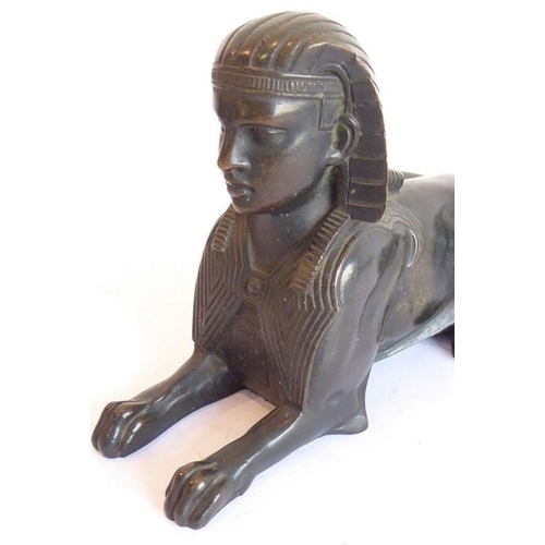 124 - A 19th century solid bronze Grand Tour sculpture of an Egyptian sphinx; of good patination and colou... 