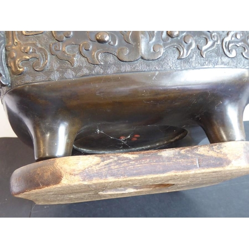 132 - A large mid 19th century patinated Japanese bronze table two-handled temple censer; Xuande mark belo... 