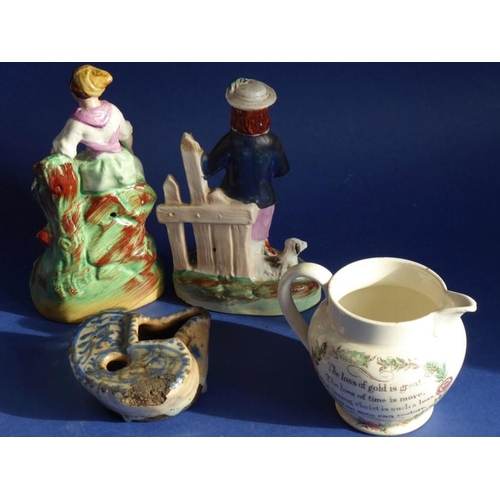 14 - A mixed pottery group to include two mid-19th century Staffordshire figures, one with a shepherd bef... 