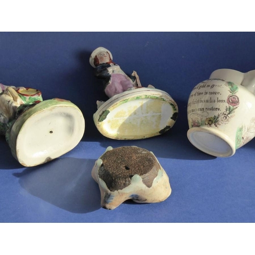 14 - A mixed pottery group to include two mid-19th century Staffordshire figures, one with a shepherd bef... 