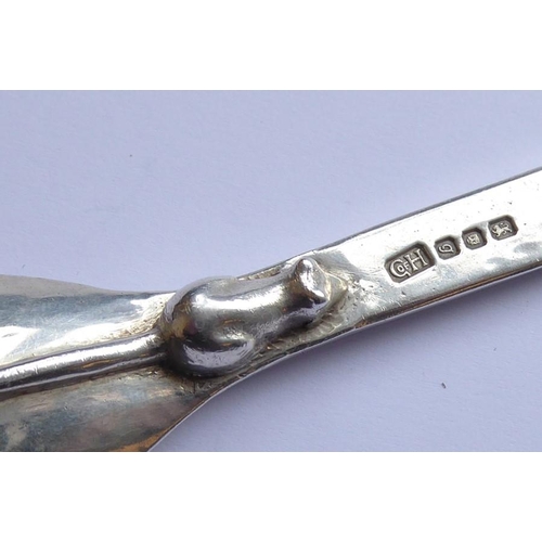 149 - A heavy handmade and planished hallmarked silver teaspoon; the underside with a rat with large tail,... 