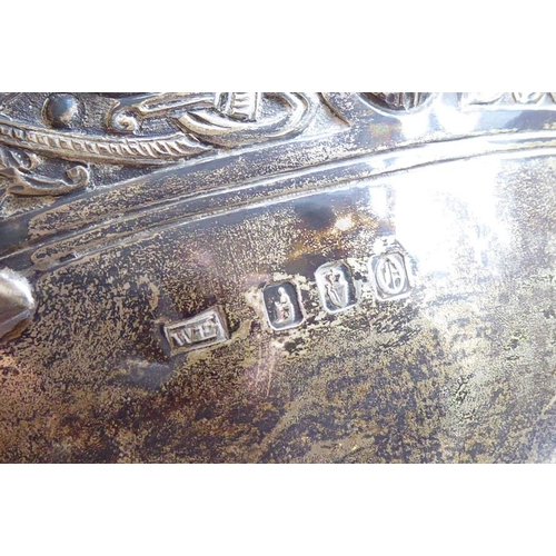 184 - A hallmarked silver two-handled pedestal bowl decorated with a Celtic-style band below the averted r... 